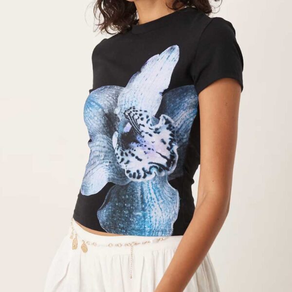 ASOS DESIGN baby tee with blue floral graphic in black