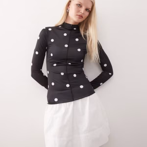 Monki long sleeve sheer T-shirt with front seam detail in black polka dot