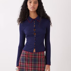 Reclaimed Vintage rib knit collared cardigan with contrast lettuce edges in navy