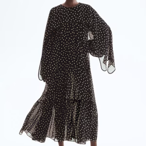 Tiered cape-detail dress