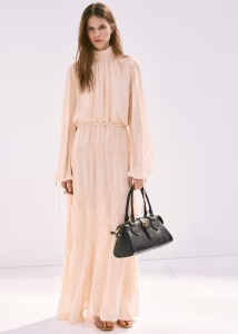 Flowing dress with embroidered details