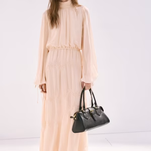 Flowing dress with embroidered details