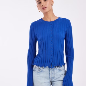 ASOS DESIGN wide rib knit ruffle cuff and hem cardigan in cobalt blue